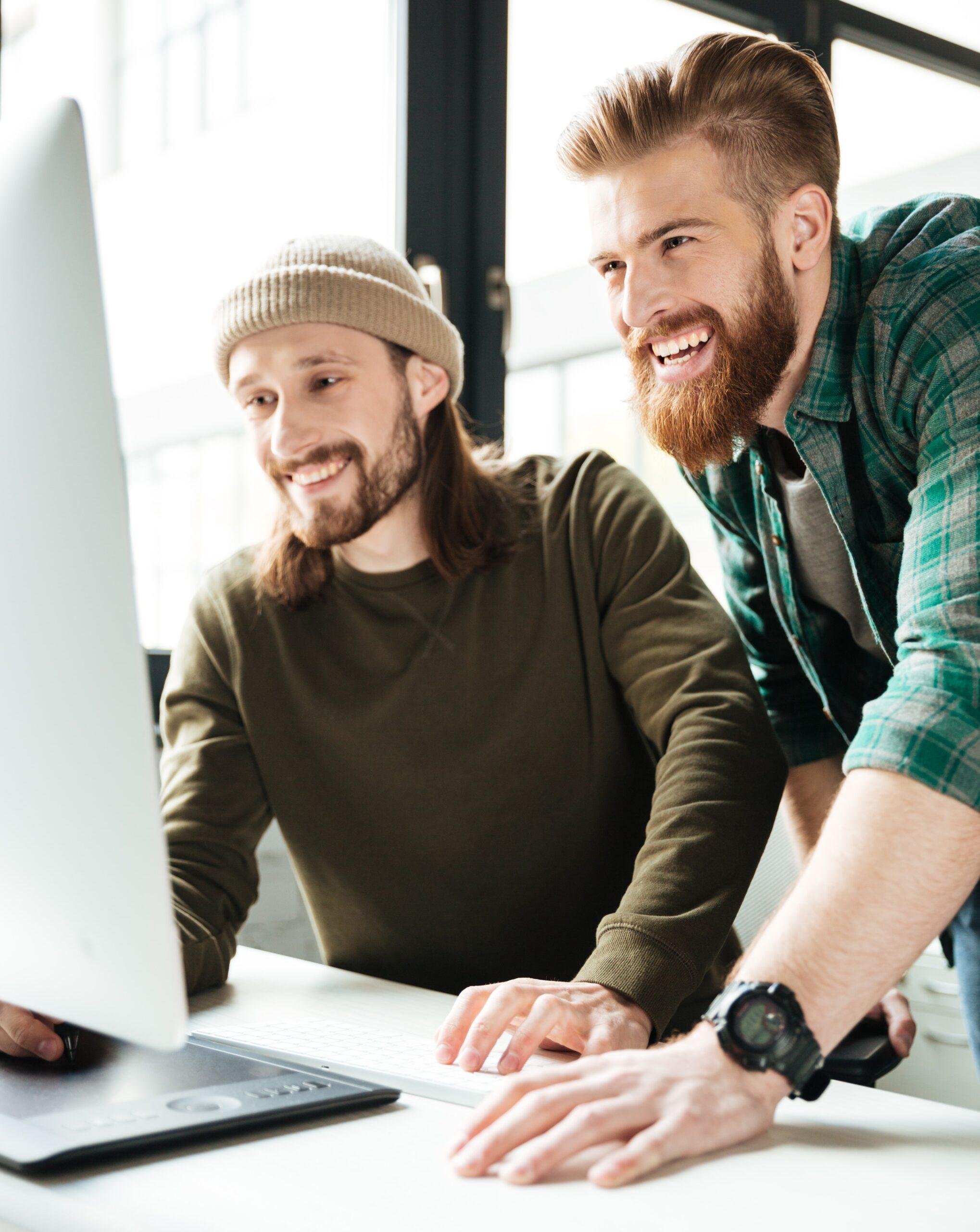 Website Designer working on Industry sites in office